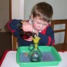 Montessori Pouring through a Funnel Lesson Activity